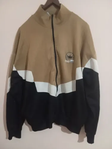 Jaqueta Adidas unissex