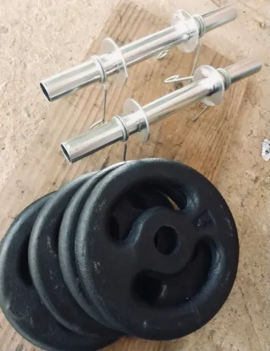 Kit com 16 kilos de anilhas e duas barras com presilhas 
