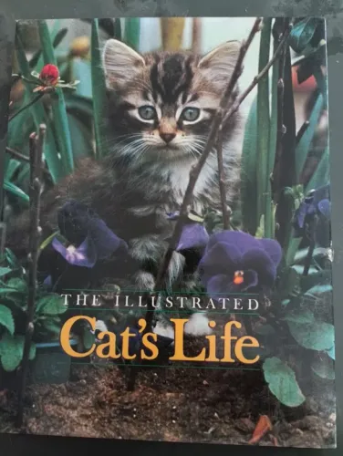 The illustrated cat's life. Capa dura, muitas fotos. Estado excelente com sobrecapa idem.