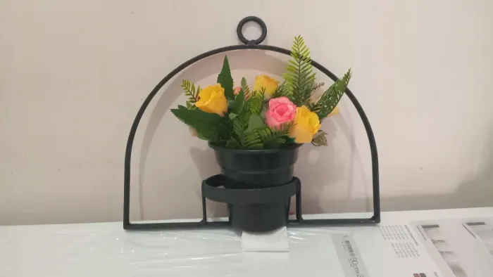 Suporte de vasos de planta em ferro