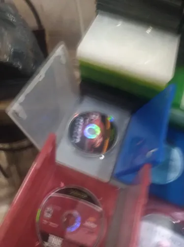60 capas estojo de dvds, e 10 jogos Xbox mais 5 de brinde de esportes.
