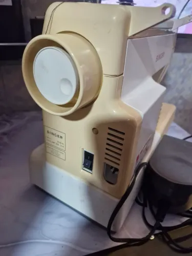 Máquina de costura desapego
