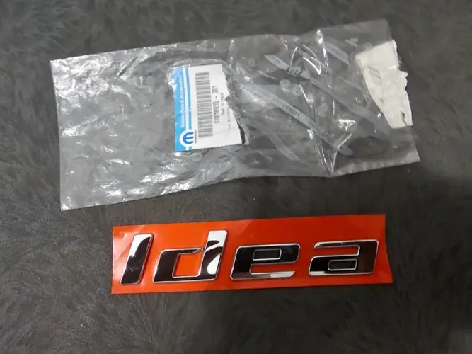 Idea  emblema tampa traseira novo original fiat 