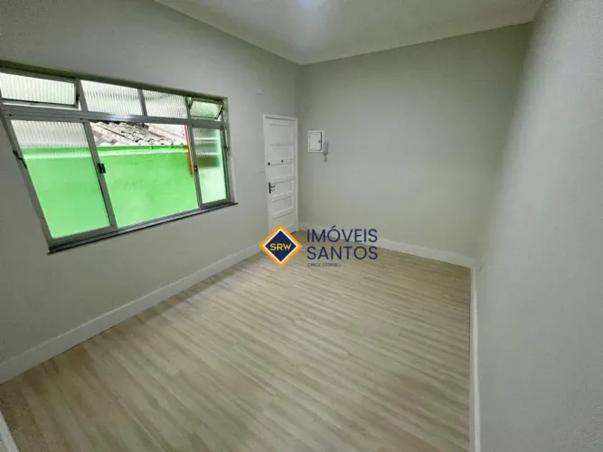 Apartamento térreo no Embaré com quintal 2 dormitórios 385mil