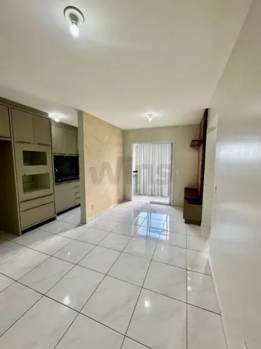 Apartamento 2 dormitórios sendo 1 suíte, semimobiliado, uma vaga garagem, próximo ao Naçõe