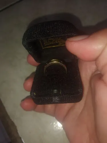 Anel de ouro branco com esmeralda e brilhantes 