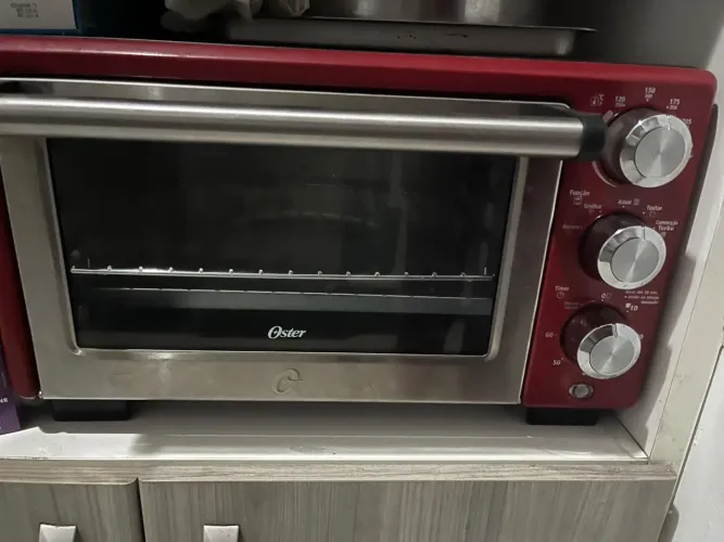 Forno Oster com tudo funcionando