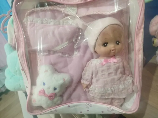 Boneca Doll Mell cha bolsa