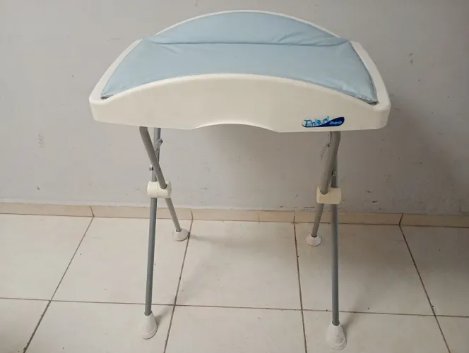 Trocador e suporte de banheira