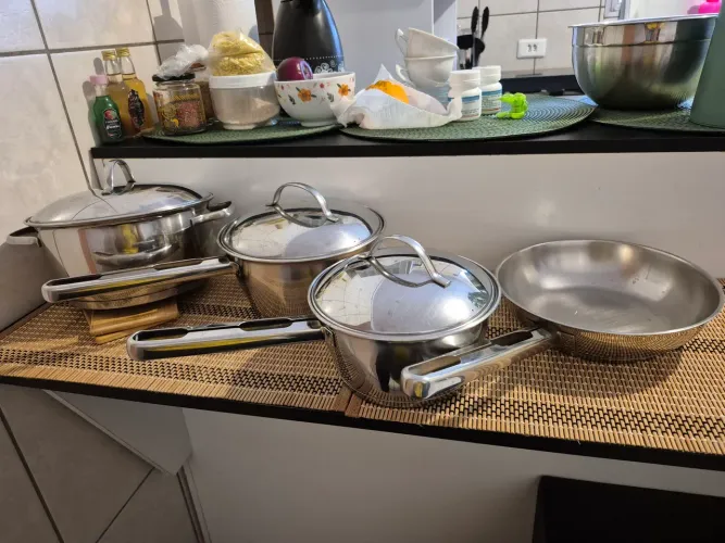 Jogo de Panelas Tramontina Allegra 4 Peças em Aço Inox com Fundo Triplo e Tampas de Inox
