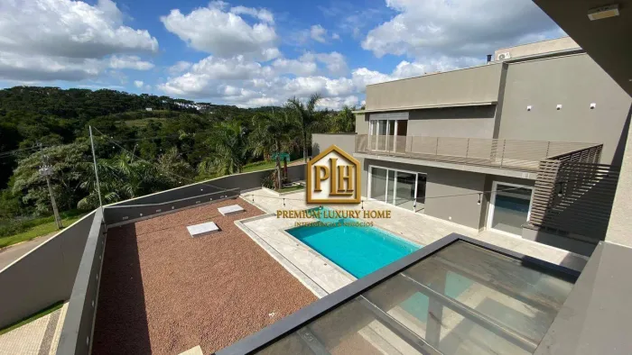Casa com 4 dormitórios à venda, 535 m² por R$ 4.500.000,00 - Condomínio Portal Horizonte -