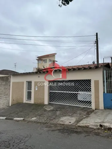 Casa à Venda em Vila Rosália, Guarulhos: 2 Suítes, 4 Vagas e Quintal Completo por R$ 900.0
