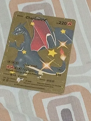Peça carta dourada pokémon charizardV rara