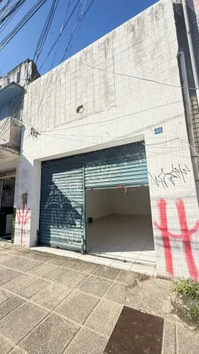 Vendo Excelente Prédio com ponto comercial,1 º andar, salas, espaço livre,copa.