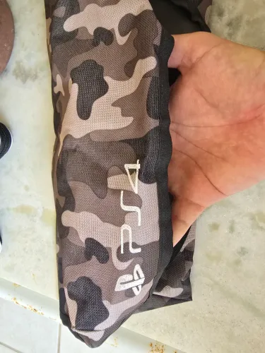Capa para ps4 fat camuflada, (usada).