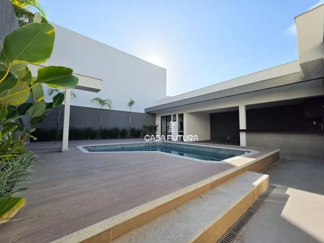 Casa Linear de Alto Padrão no Jardim Esperança 3 Suítes, Piscina com Cascata e Jardim de