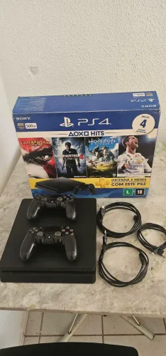 Playstation 4 na caixa original 2 controles e 5 jogos