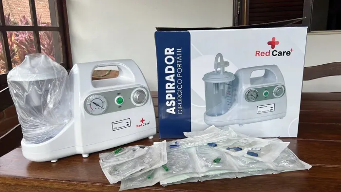 Aspirador De Fluidos E Secreções Portatil Red Care 127/220v