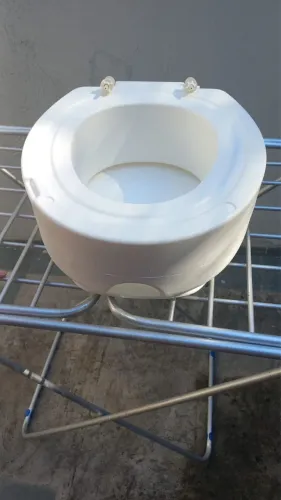 Assento sanitário de elevação