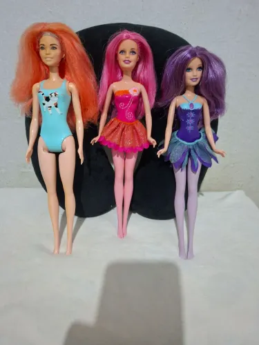 3 barbies originais como estão. 