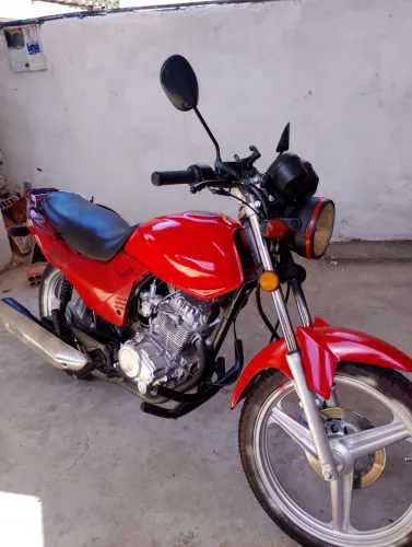 Moto Traxx 125 com transferência