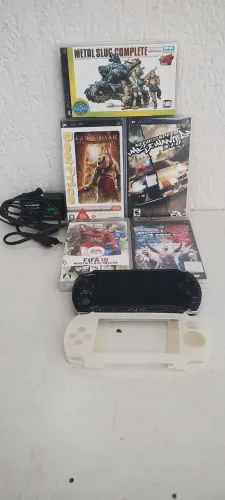 Psp console sony+ capa de silicone+5 cds original carregador similar 