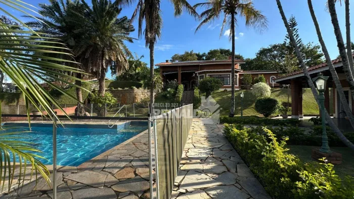Casa com 4 dormitórios à venda, 321 m² por R$ 1.950.000 - Condomínio Capela do Barreiro - 
