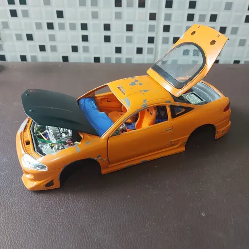 Miniatura sucata mitisubshi eclipse 1995 escala 1/24 jada toys