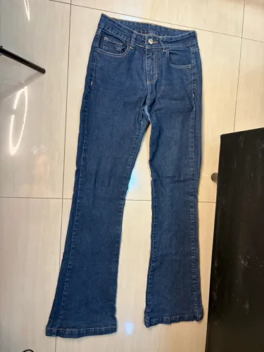 Calça jeans cintura baixa boca de sino tamanho 38 lycra/estica