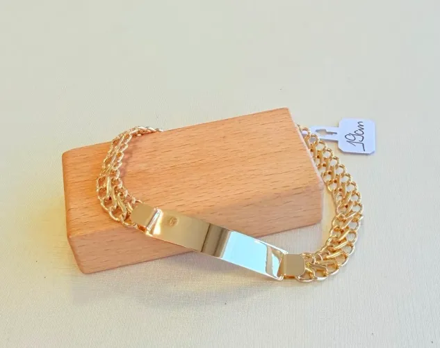 Pulseira Placa ouro 18k. Comprimento 19cm, 7mm, 4.77gr.