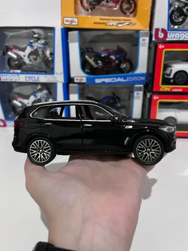 Miniatura BMW X5 xDrive40i abre portas acende faróis som de motor carro 1/32 NOVO