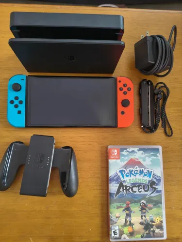 Nintendo Switch OLED 64GB, original, muito bem conservado e funcionando perfeitamente.