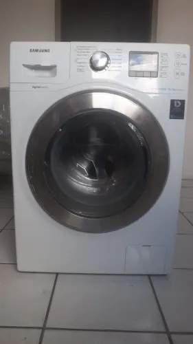 Máquina de lavar e seca roupa Samsung  está funcionando perfeitamente 