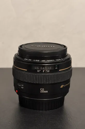 Canon EF 50mm f/1.4 USM ? muito bem cuidada