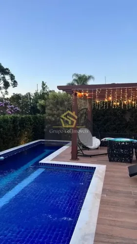 Casa com 4 dormitórios à venda, 415 m² por R$ 5.000.000,00 - Condomínio Portal do Lago - V