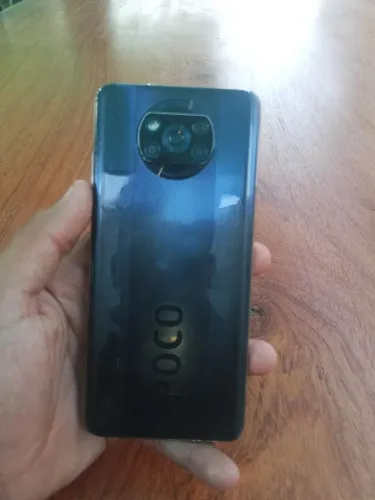 Vendo celular poco X3 original câmera  ótima bateria top de linha 
