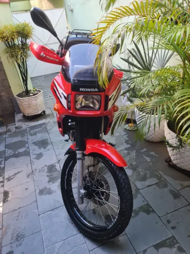 Nx 350 sahara 16.500,00 não aceito ofertas moto sem igual .