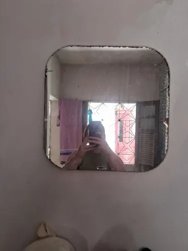 Vendo dois espelhos bem condenados 