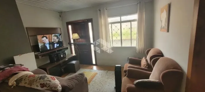 Casa de 3 dormitórios térrea em rua calma e arborizada, 2 vagas de garagem