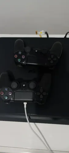 PS4 com PSN Deluxe 12meses.