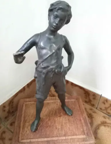 Escultura antiga de bronze
