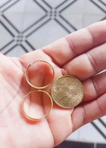 Argolinha de ouro 18kl.... grossa. Obs Com defesa blz 600,00 reais ? aceito cartão.