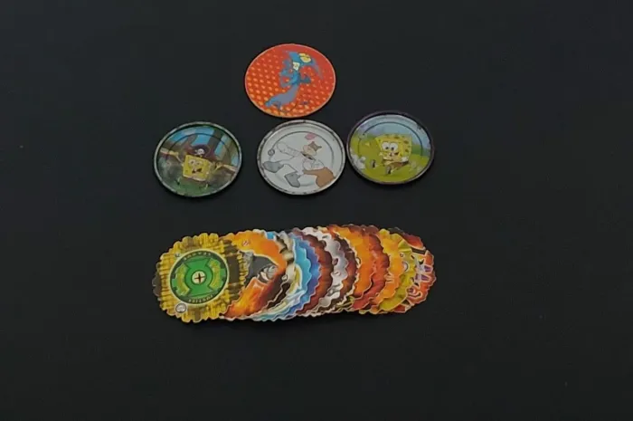 Tazos spiners liga da justiça+ Bob esponja Elma chips 