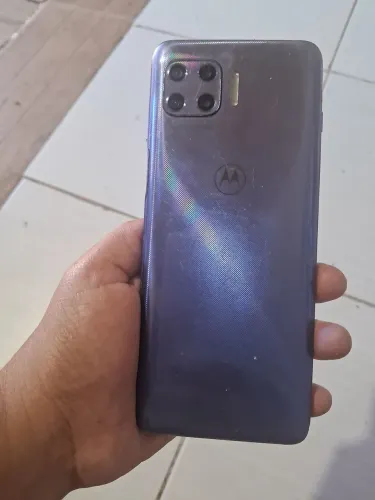 Motorola roxo, vendido no estado em que se encontra.