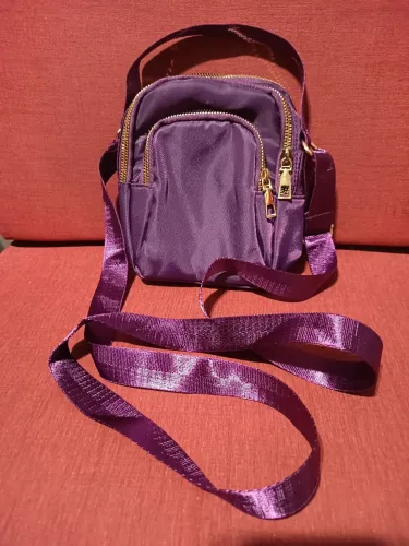 Bolsa roxa transversal 14x19x8 nova