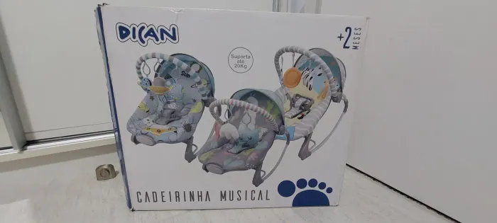 Cadeirinha de descanso Dican tema espacial, bem conservada.