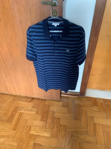 Polo Lacoste listrada azul marinho