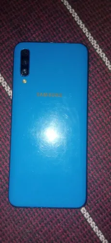 Galaxy a50 novinho azul, aceito troca em outros celulares 