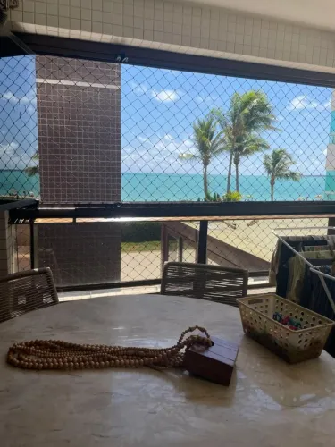 Apartamento pe na areia e vista mar com 3 dormitórios à venda, 125 m² por R$ 1.900.000 - J