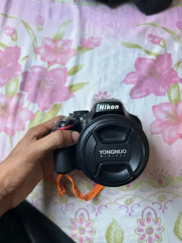 Vendo Nikon D5100 ou troco com volta minha